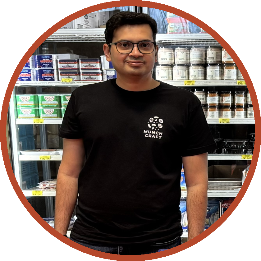 Zubin Kuvadia, founder of Munch Craft, standing in a specialty grocery store